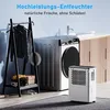 A laundry room or utility area with a washing machine, a drying rack with clothes, and a dehumidifier. Produktbild-Vorschau