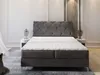 A bed in a room with bedside tables and lamps. Produktbild-Vorschau