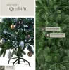 A collage showing a decorated Christmas tree on the left and a close-up of its branches on the right, with text overlays highlighting product features. Produktbild-Vorschau