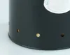 A close-up view of the bottom part of a black cylindrical storage container with several small holes around its base. Produktbild-Vorschau
