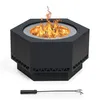 A black hexagonal fire pit with flames burning inside, shown on a white background with a fire poker tool in front. Náhled obrázku produktu