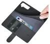 A hand is shown holding open a black leather wallet-style phone case, revealing credit cards and a 20 Euro banknote inside. Produktbild-Vorschau