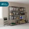 A storage room with two metal shelving units filled with various storage bins, boxes, and supplies. A stepladder is placed to the left of the shelves. Náhled obrázku produktu