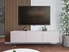 A modern media console with a TV mounted above it, set against a slatted wood accent wall. Produktbild-Vorschau