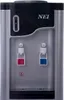 A front view of a black and silver NEI water dispenser with hot and cold water taps. Produktbild-Vorschau