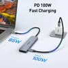 A laptop connected to a USB-C hub, which is then connected to a power adapter, illustrating fast charging. Produktbild-Vorschau