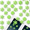 Green fluorescent snowflakes are applied to a window frame and glass. Podgląd zdjęcia produktu