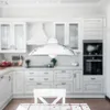 A white pendant lamp with a decorative pattern hangs in a bright, modern kitchen. Anteprima dell’immagine prodotto