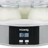 Close-up of a yogurt maker's digital display and some of the yogurt jars. Produktbild-Vorschau
