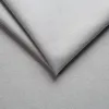 A close-up view of a folded gray fabric. Produktbild-Vorschau