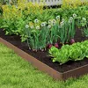 A raised garden bed with metal edging, filled with various plants including lettuce, onions, and yellow flowers. Produktbild-Vorschau