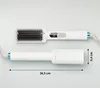 A white hair straightening brush and its handle are displayed against a light gray background. Dimensions are indicated with measurement lines and text. Produktbild-Vorschau
