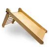 A wooden children's slide with a ladder attachment, shown against a white background. Podgląd zdjęcia produktu