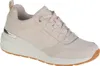 A single beige Skechers wedge sneaker is shown from a side angle against a white background.