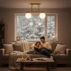 A family reading a book by the window on a snowy day. Náhľad obrázku produktu