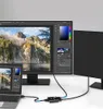 A computer setup with multiple monitors and a laptop connected to a switch. Produktbild-Vorschau