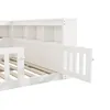 A close-up view of a white wooden bed frame with a built-in shelf unit and a removable guardrail. Voir les images du produit