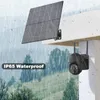 A solar-powered security camera with a solar panel mounted on an overhang, during a rain shower. Podgląd zdjęcia produktu