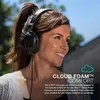 A woman wearing headphones outdoors. Náhled obrázku produktu