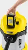A hand is inserting a battery into a yellow and black Kärcher wet/dry vacuum cleaner. Produktbild-Vorschau