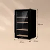 A black wine cooler with dimensions indicated by measurements. Produktbild-Vorschau
