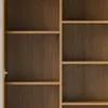 A close-up view of a wooden cabinet with shelves. Voir les images du produit