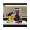 A black VERTENZ Titan 30 blender is displayed on a kitchen counter with various accessories and ingredients. Podgląd zdjęcia produktu