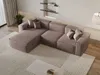 A modern sectional sofa in a living room setting. Produktbild-Vorschau
