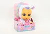 A doll in its packaging, presented against a white background. Voir les images du produit