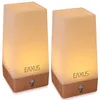 Two identical night lamps with a copper-colored base and a frosted white top, emitting a warm yellow light. Voir les images du produit