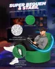 A man sitting on a large green beanbag chair in a dimly lit room with screens in the background. Produktbild-Vorschau