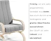 A close-up of a gray armchair with wooden accents, next to a text description of its fabric. Podgląd zdjęcia produktu