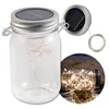 A solar-powered LED light in a mason jar, with a close-up inset showing the light turned on in a similar jar. Produktbild-Vorschau
