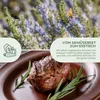 A close-up of a steak on a plate with rosemary, with a background of blooming flowers and text overlays. Produktbild-Vorschau