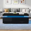 A modern living room with a gray sofa and a black coffee table with blue LED lighting. Produktbild-Vorschau