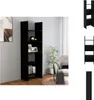 A black bookshelf is shown in a room with a chair and a plant. Náhled obrázku produktu