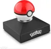 A Pokémon Poké Ball replica on a black stand with the Pokémon logo. Náhľad obrázku produktu