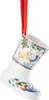 A ceramic Christmas stocking ornament with a festive winter scene painted on it. Produktbild-Vorschau