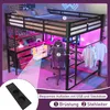 A loft bed with a desk and gaming chair, featuring LED lighting and USB/power outlets. Anteprima dell’immagine prodotto