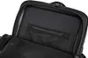 Close-up view of the interior of a black backpack, showing a padded compartment and a mesh pocket. Anteprima dell’immagine prodotto