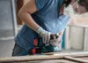 A person is using a sander on a piece of wood. Produktbild-Vorschau