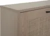 A close-up view of a wooden cabinet with a rattan front. Anteprima dell’immagine prodotto