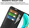 A close-up view of a black wallet case for a phone, showing credit cards and a banknote inserted into the card slots. Produktbild-Vorschau