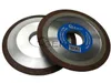 Two grinding wheels are shown against a white background. One wheel is in focus and has a blue label with text and a barcode. Produktbild-Vorschau