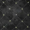 A net of lights against a dark, textured background. Produktbild-Vorschau