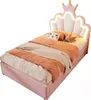A pink bed with a crown-shaped headboard and LED lights, decorated with pillows and blankets. Produktbild-Vorschau