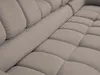 A close-up view of a tufted sofa's armrest and seating area. Produktbild-Vorschau