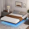 A bedroom scene with a bed, nightstand, and decor. Produktbild-Vorschau