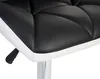 Close-up of the seat of a black and white bar stool. Anteprima dell’immagine prodotto