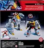 The back of a Transformers toy box showing two action figures, Grimlock in dinosaur mode and a robot figure, with text and logos. Náhľad obrázku produktu
